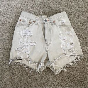 Levi’s high-waisted grey distressed jean shorts
